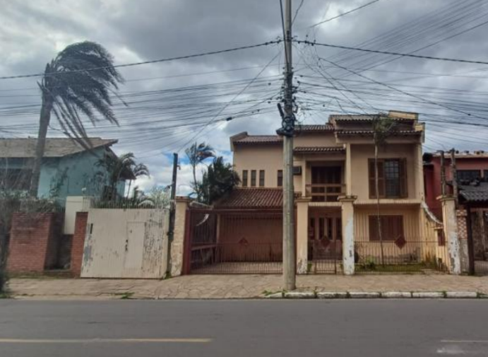 Casa em Canoas, Rio Branco, Rua Pistóia 38 Rio Branco, RS. Área: 232.28m2